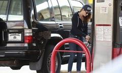 Kristen Stewart Pumps Gas Into Another Old Car